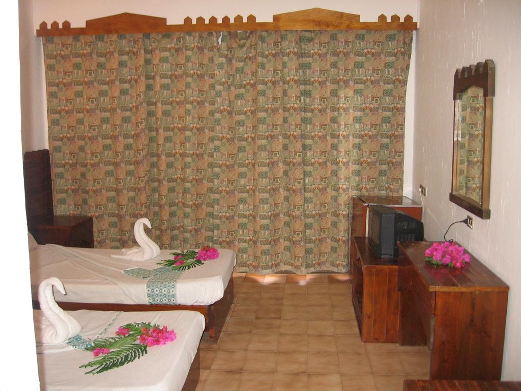 Helnan Taba Hotel Habitación foto